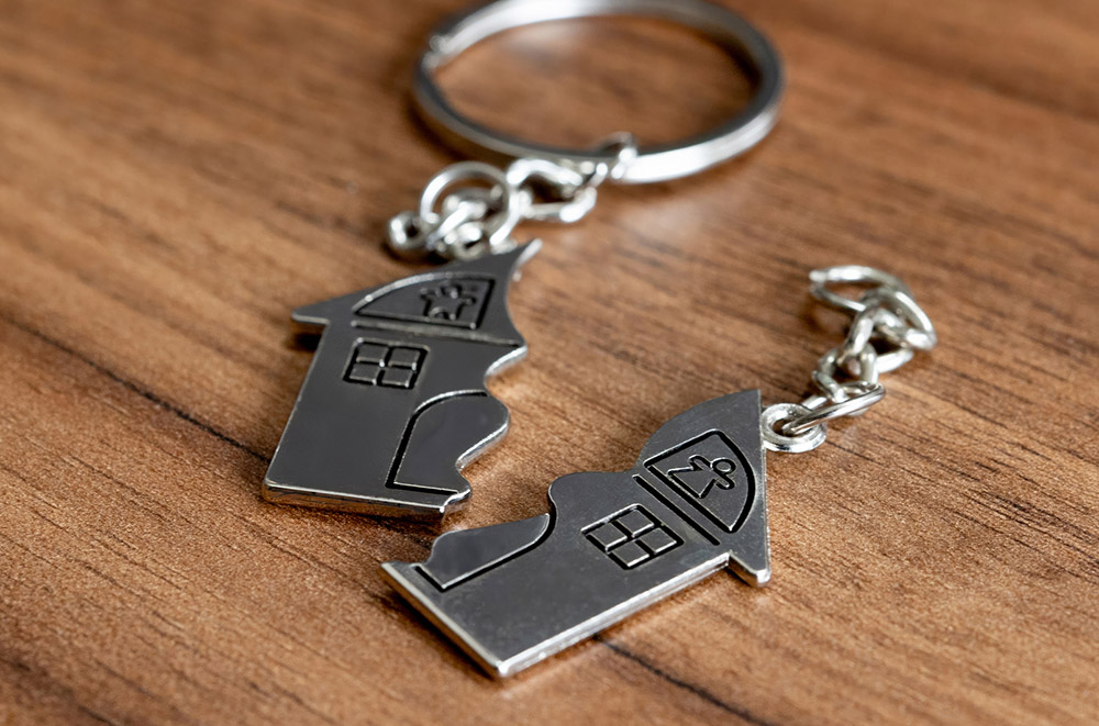 Image of separated keychains depicting property division